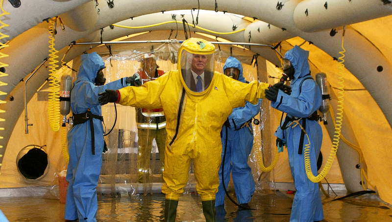 Illustration for article titled ‘It’s Not So Bad,’ Mike Pence Reports On Conditions Of Detainment Center While Hazmat Suit Disinfected